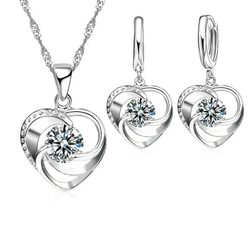 Hänger und Ohrringe aus Sterlingsilber in Herzform