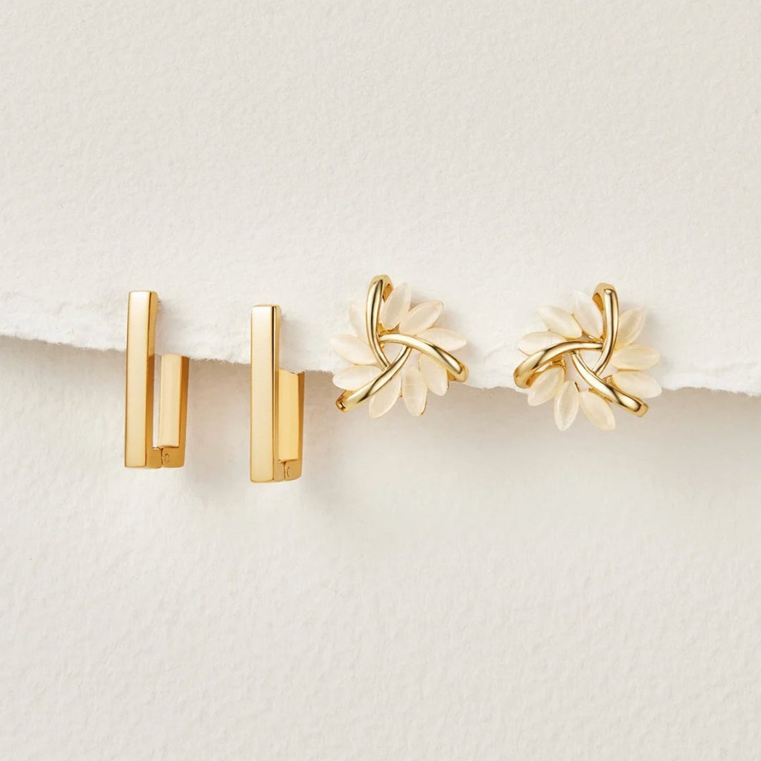 Céline – Goldene Ohrringe mit geometrischem Mix.